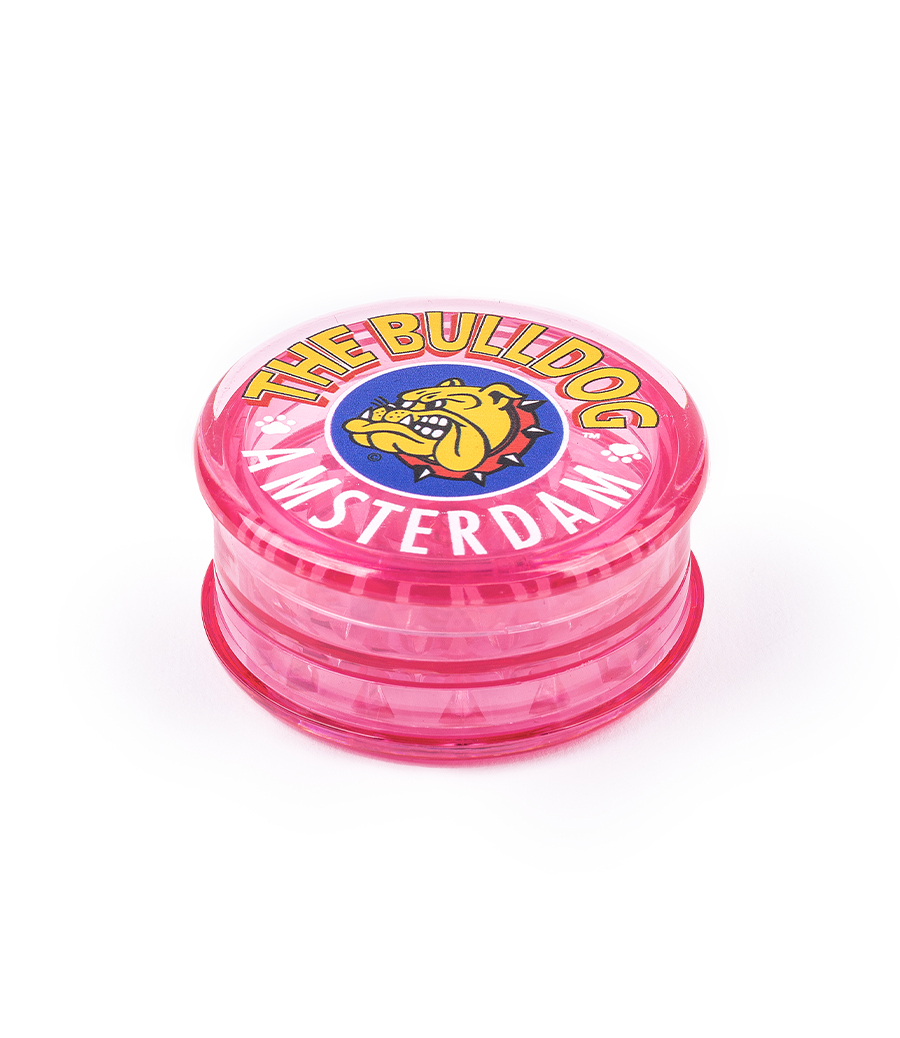 The Bulldog grinder is a 3-piece, pink plastic grinder that is with the iconic The Bulldog logo on its lid. A lightweight grinder with magnetic closure and pyramid shaped teeth that effortlessly shred and grind your material into the desired texture. The grinder is 60mm in diameter.